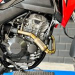 Curva coletora em inox com bomber Honda Sahara 300