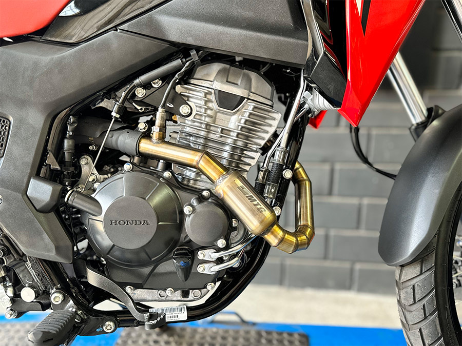 Curva coletora em inox com bomber Honda Sahara 300